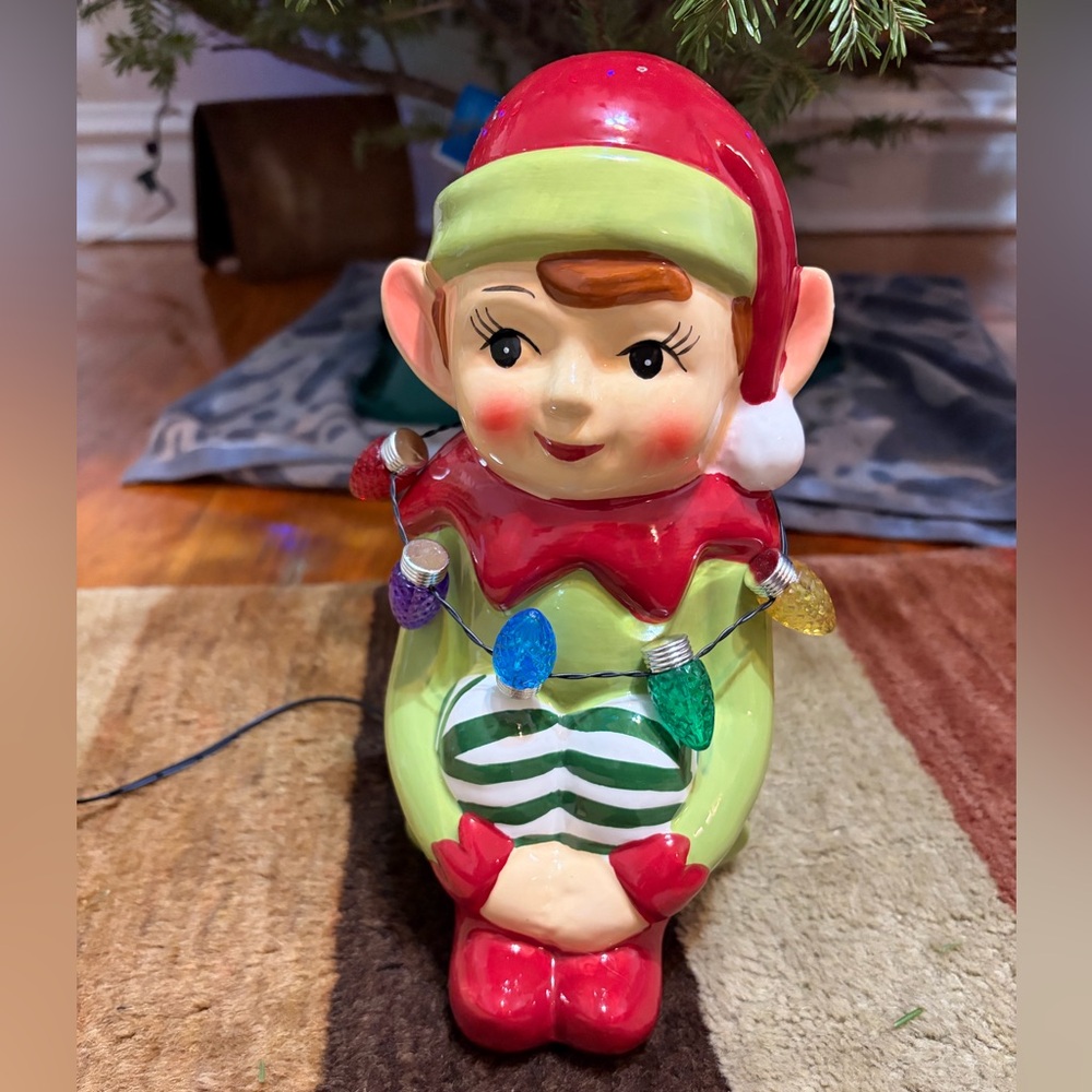 Elf porcelain figurine with lights